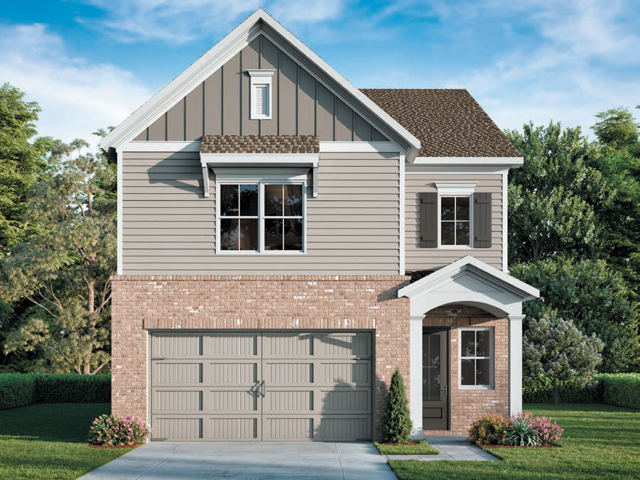 Two-story suburban house with gray siding, a brick lower facade, large double garage door, and front porch. The home has white trim, a gable roof, and is surrounded by greenery.